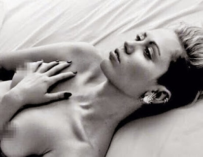 Miley Cyrus posts topless photo of herself on instagram