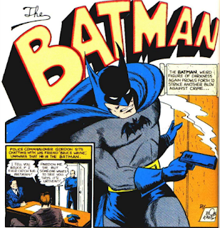 This is a picture from Detective Comics #35 showing Batman holing a smoking pistol.