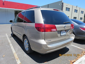 Dented & scraped Toyota Sienna after collision repair.