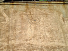 Detall, molt desdibuixat, del rellotge de sol de la façana de migdia de la Rectoria de Gaià