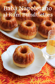 Food Lust People Love: These babà Napoletano al rum bundtlettes are a traditional Italian dessert baked in an unconventional pan that does them proud. The hole in the middle gives extra surface area for absorbing the rum syrup and that is a very good thing!