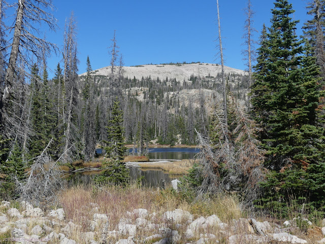 01: small and larger lake with bulge of rock behind