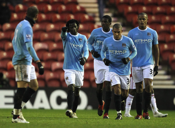 Benzima celebrates his winning score wit teammates