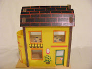 I had so enjoyed experimenting with a folk art dolls house that I decided to .