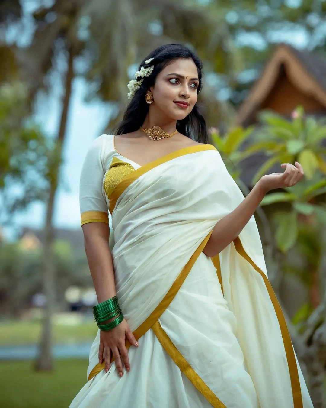 Actress Amala Paul Looks in White Half Saree Photoshoot