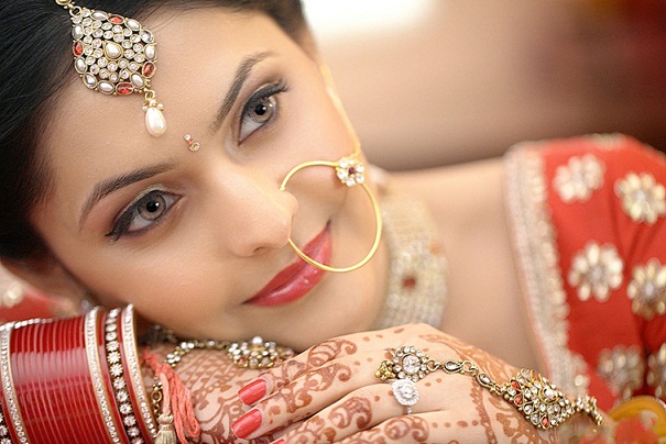 Bridal nose pin jhumar is elegant style for newly bride.