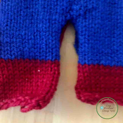 picture of close up of knitted spidermans legs and feet