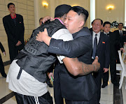 First North Korean leader to hug an American (kim rodman hug)