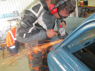 Myk grinding the built up weld