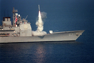 Tomahawk land attack missile is fired from a MK 41 VLS aboard a Ticonderoga-class guided missile cruiser