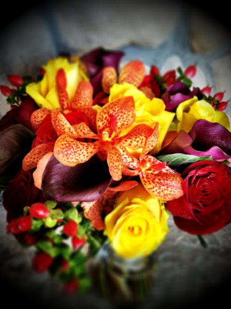 This bridal bouquet 39s recipe called for yellow and red Roses orange Orchids