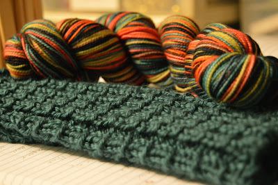 on the needles, fingerless gloves for a gift for Amber and yarn from Knit Knot Studios.