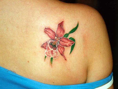 An awesome chic butterfly tattoo with flowers design is embedding on blade