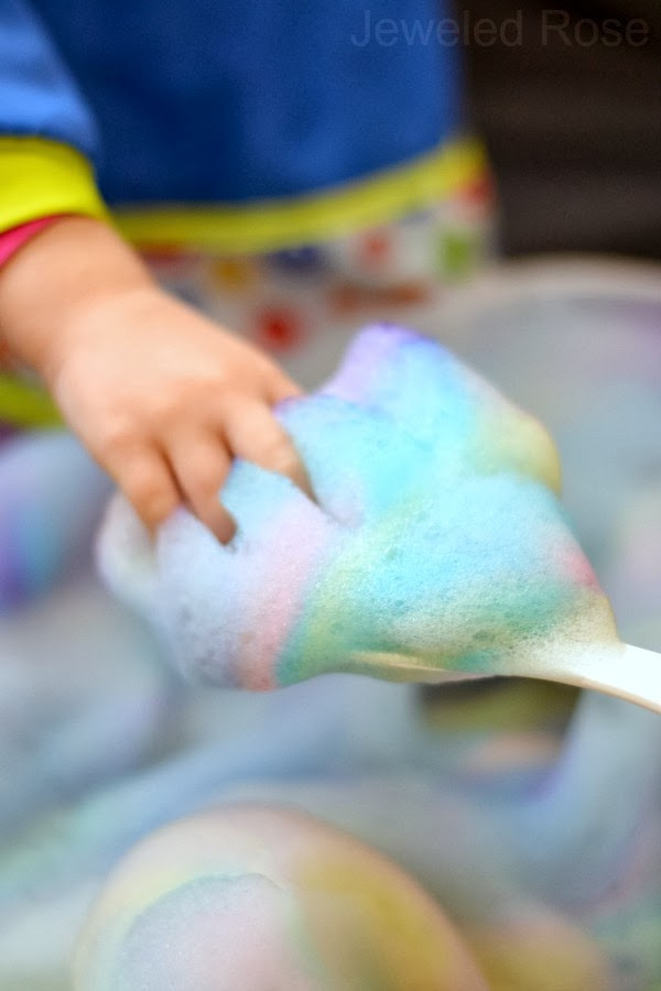 Make rainbow soap foam for kids using Kool-aid! #soapfoam #soapfoamrecipe #playfoamideaskids #rainbowsoap #growingajeweledrose #activitiesforkids