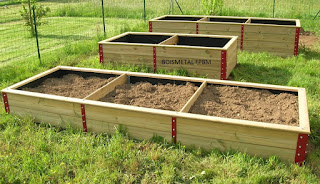 Carré potager pas cher bois et acier laqué. Fabrication artisanale.