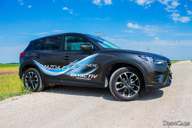 The 2015 Mazda CX-5 - side view and front fenders - close up.