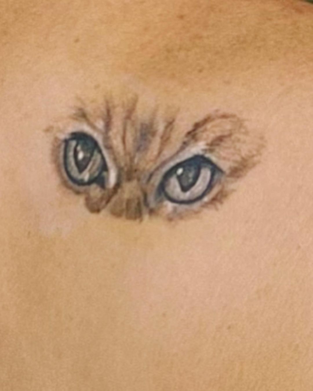 Tattoo of a cat's face