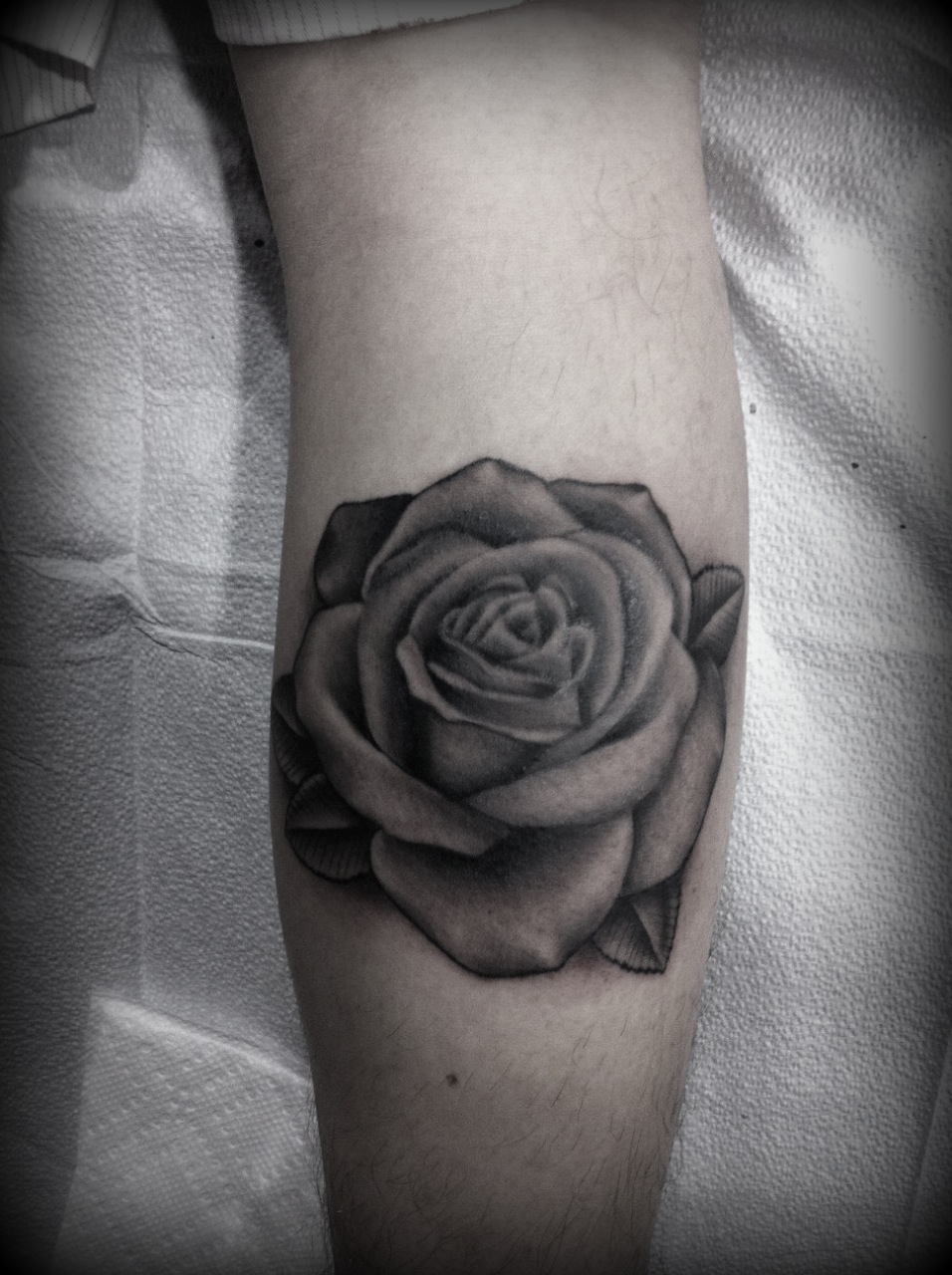 Black and grey rose. I love tattooing stuff like this.