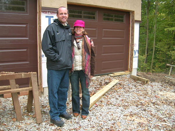 Standing in front of our new garage doors