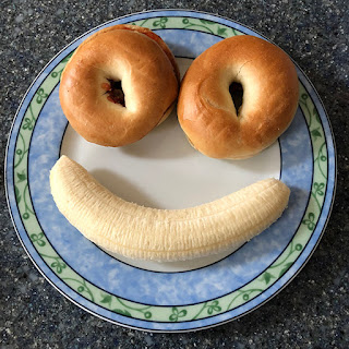 Low Fat breakfast, bagel, jam, and banana