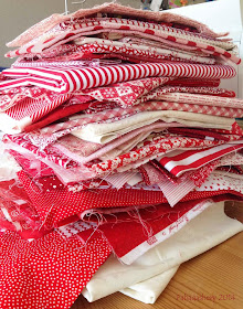 Red and white fabric stash
