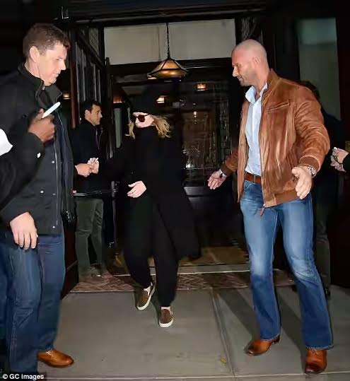 Check out Adele's hot new bodyguard