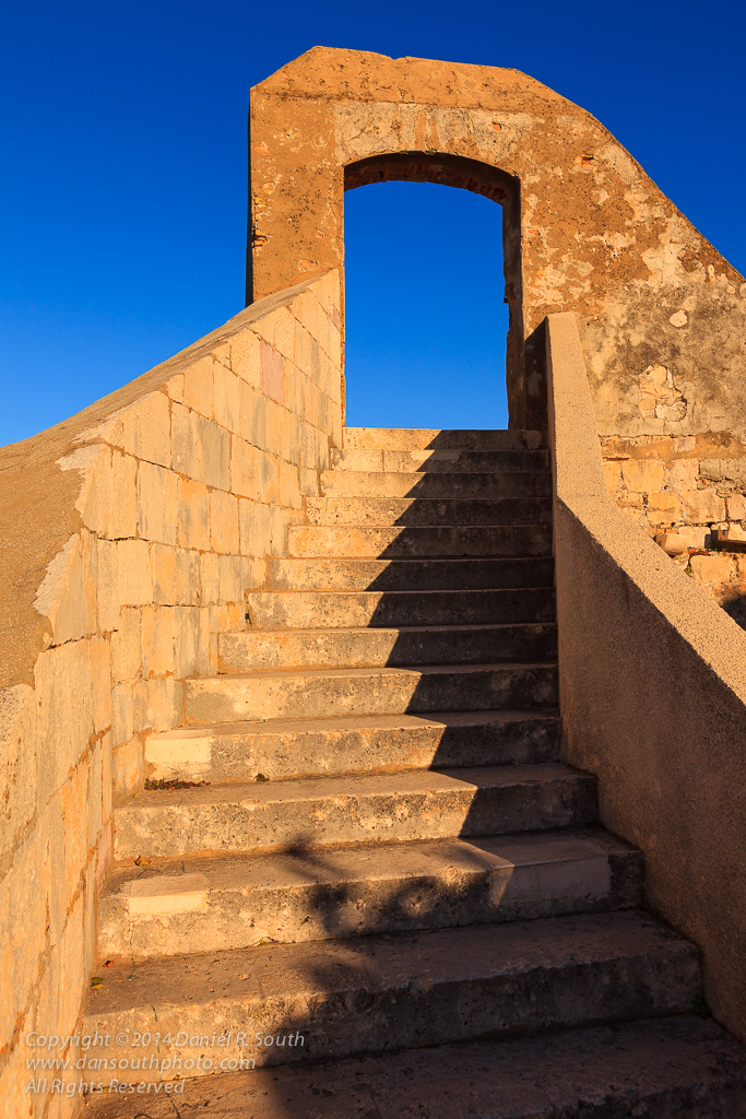a photograph of a stairway atop the city walls in dubrovnik croatia