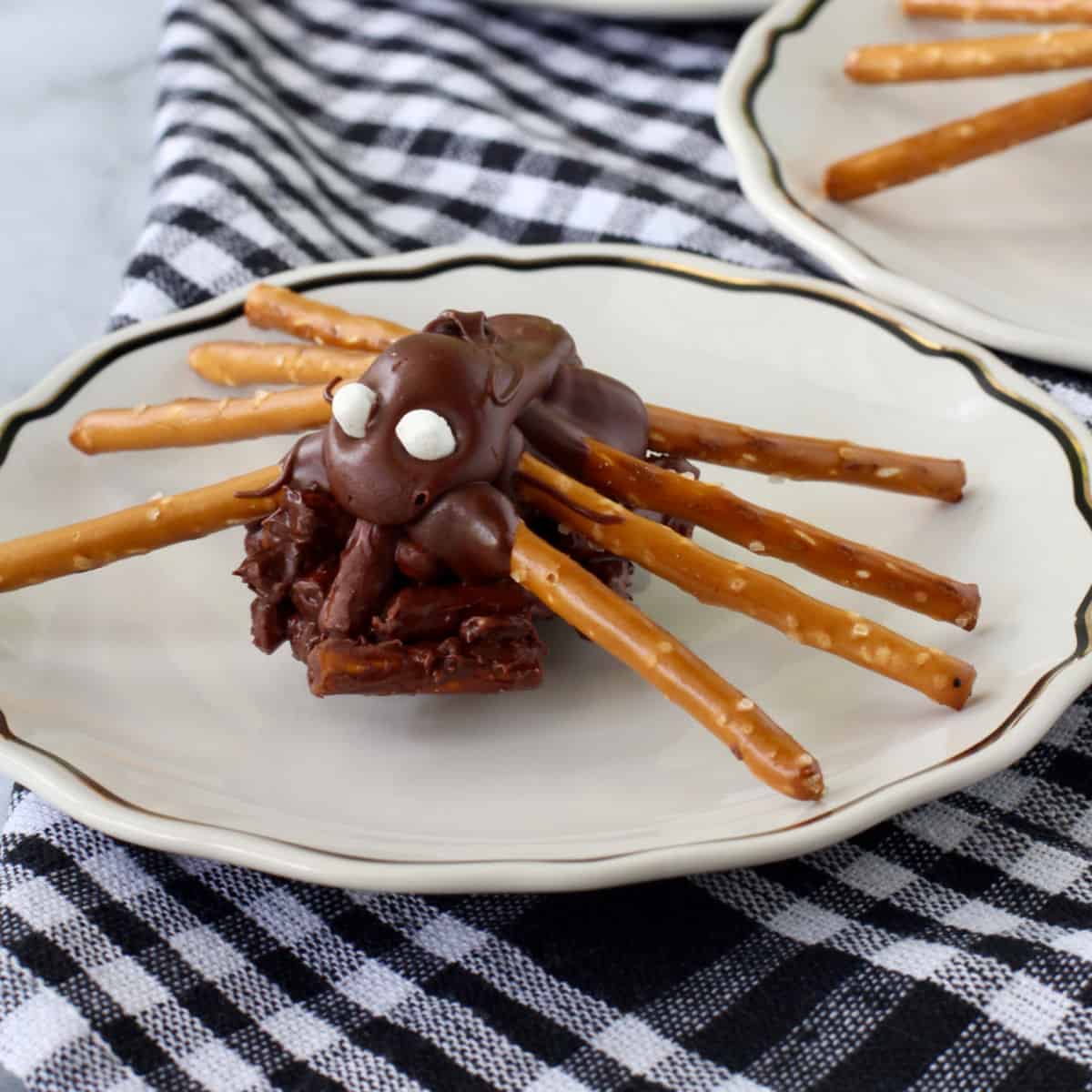 Chocolate Peanut Butter Spider Bites on individual plates.