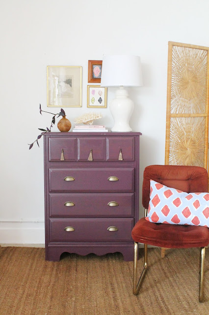 luxe purple dresser with tassel and brass pulls