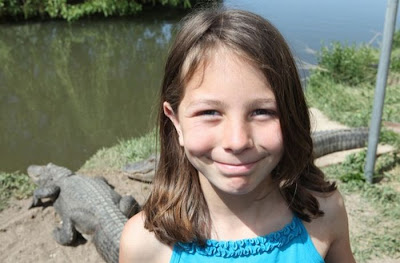 A 9-year-old alligator wrestler Samantha Young lives at the Colorado Gators Reptile Park. 