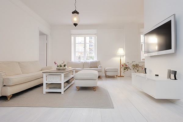 buy an apartment En plein centre de Stockholm un appartement blanc du sol au plafond  | 600 x 399