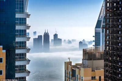 Dubai-based German photographer Sebastian Opitz captures the surreal and mystical look of his adopted city as fog rolls in and out at sunrise. The photographer renames the cityscape as Cloud City for the brief moments when the mist takes over and fills the empty space between the towering buildings. Optiz's images offer a serene and dreamy view of a bustling city, re-imagining it as a heavenly metropolis in the sky.