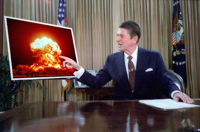 Reagan pointing at a nuclear explosion