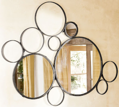 By incorporating mirrors into your design, you can create a room that 