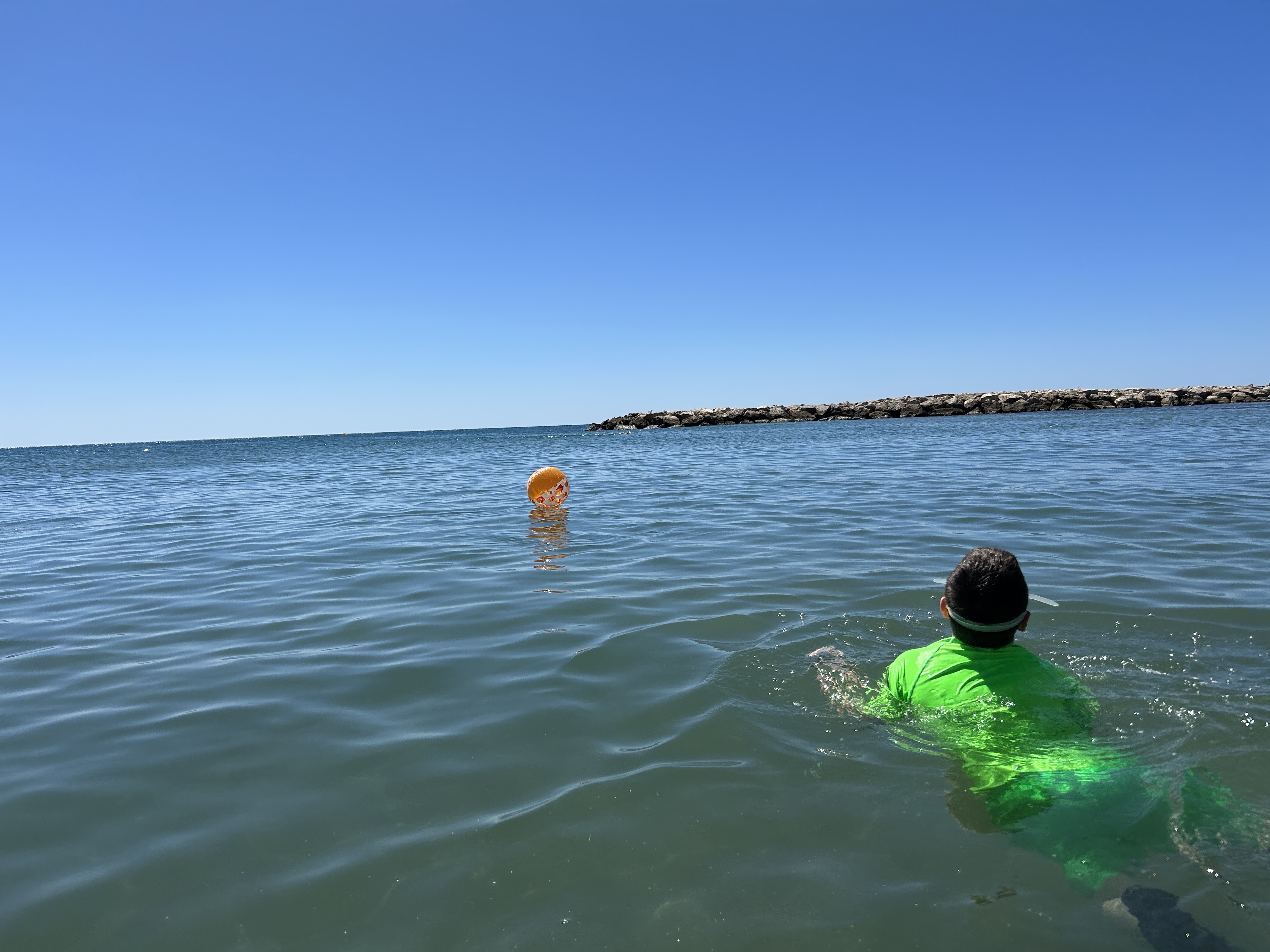 boy swimming in the sea