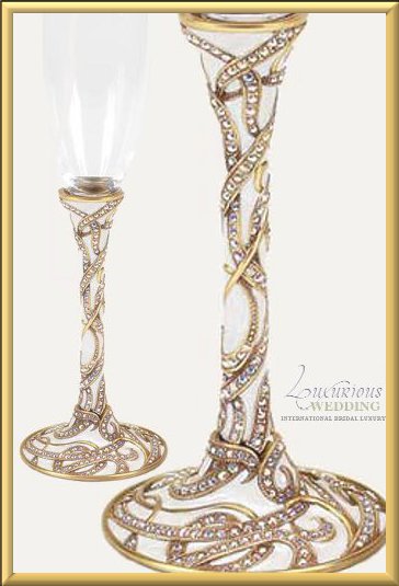 The Intertwined Toasting Flutes from Luxurious Wedding Accessories are 