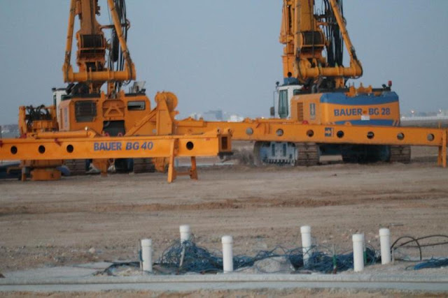 Picture of two yellow piling machines on the Kingdom Tower construction site