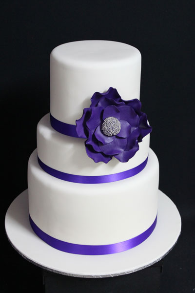 Purple White Wedding Cake We just love this gorgeous cake from How Sweet 