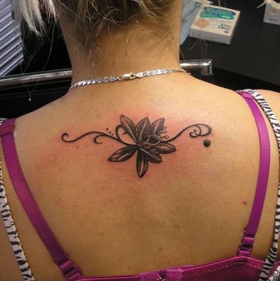 flower tattoos on lower hip