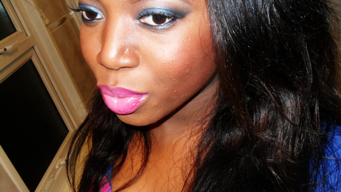 pink lipstick on dark skin. lips and pink lipstick.