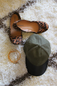 What I bought this month: Target leopard flats a baseball cap and a gold belt on a hammer and heels