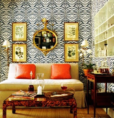 The zebra print throw rug added in this space gives it such an amazing face 