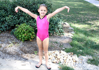 Earlier in the week, we stopped by Flip-Flop so Tessa could pick out her first leotard. I'm glad she chose the pink one. The other ones she considered were animal prints in garish colors!