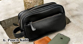 Pouch Kulit merupakan salah satu ide design pouch simple dan keren untuk souvenir pernikahan