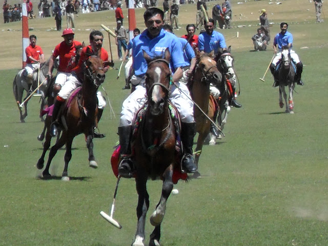 Players from Gilgit and Chitral in action at the Shandur Polo Festival Gilgit Baltistan,  Pakistan