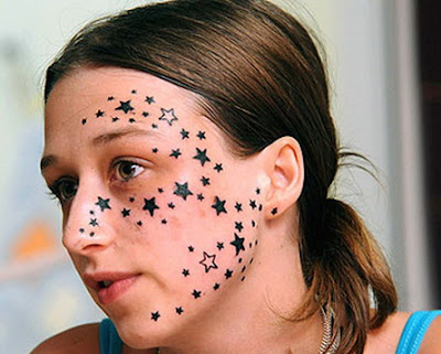 woman star tattoos