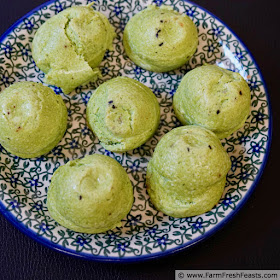 pic of green eggs no ham--Instant Pot Spinach and Parm Egg Bites on a blue & green plate