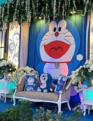 dekorasi pernikahan doraemon terbaru