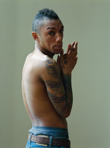 Dragon Tattoo Shirtless black man having sleeve dragon tattoo