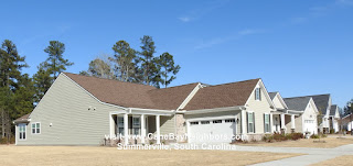 Four seasons at Cane Bay offers side entry home